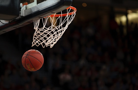 Basketball going into net