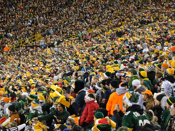 Green Bay Packers Fans cheering and sharing in the story of their team